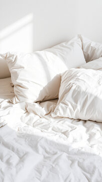 Minimalist white bedroom with soft bedding, natural light, and serene atmosphere &mdash; ideal for relaxation and rest