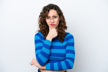 Young caucasian woman isolated on white background having doubts