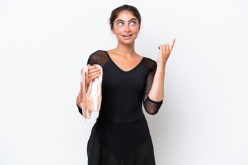 Young caucasian woman practicing ballet isolated on white background pointing up a great idea