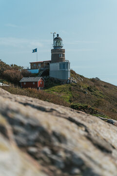 Kullen Lighthouse on a sunny day at Kullaberg Nature Reserve in Southern Sweden