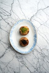 Deep Fried Cheese Balls with Sauce on a Plate, close-up