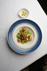 Healthy seafood salad with shrimps, avocado and grapefruit