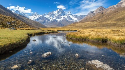 Naklejka premium Serene Alpine Valley with Snow-Capped Peaks
