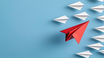 A vibrant red paper airplane leading a group of white paper airplanes on a blue background, symbolizing innovation and leadership.