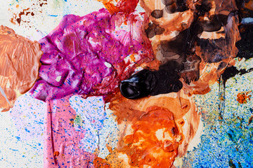 Colorful abstract texture. Smears of oil paint on an art palette. The concept of the modern school of art. Fragment of creative work. Colors of the year 2025