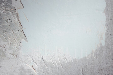 Plastered beige surface with cement material. Textured pattern with space for text. Texture of old gray concrete wall for background. Calm neutral spa background. 