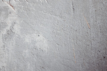 Plastered beige surface with cement material. Textured pattern with space for text. Texture of old gray concrete wall for background. Calm neutral spa background. 