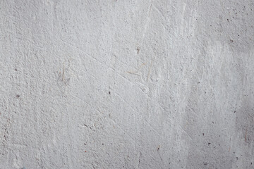 Plastered beige surface with cement material. Textured pattern with space for text. Texture of old gray concrete wall for background. Calm neutral spa background. 