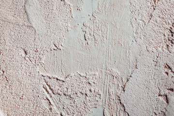 Plastered beige surface with cement material. Textured pattern with space for text. Texture of old gray concrete wall for background. Calm neutral spa background. 