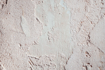 Plastered beige surface with cement material. Textured pattern with space for text. Texture of old gray concrete wall for background. Calm neutral spa background. 