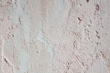 Plastered beige surface with cement material. Textured pattern with space for text. Texture of old gray concrete wall for background. Calm neutral spa background. 