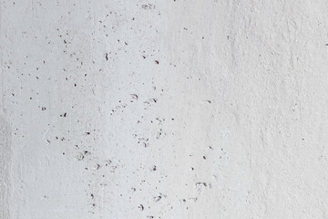 Plastered beige surface with cement material. Textured pattern with space for text. Texture of old gray concrete wall for background. Calm neutral spa background. 