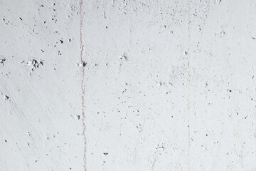 Plastered beige surface with cement material. Textured pattern with space for text. Texture of old gray concrete wall for background. Calm neutral spa background. 