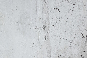 Plastered beige surface with cement material. Textured pattern with space for text. Texture of old gray concrete wall for background. Calm neutral spa background. 