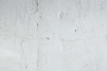 Plastered beige surface with cement material. Textured pattern with space for text. Texture of old gray concrete wall for background. Calm neutral spa background. 