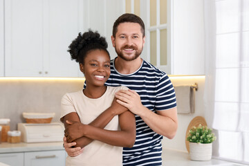 International relationships. Portrait of lovely couple in kitchen