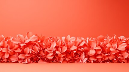 Fototapeta premium Vibrant pink flowers on a coral background, perfect for decorative use.