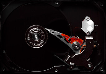 Inside of a hard disk drive. HDD.  Computer parts close-up. Concept for a server with information...