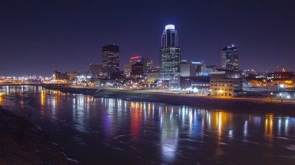 Naklejka premium Glowing City Skyline at Night Over Water
