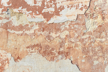 A fragment of a wall with red tints and yellow tint in the style of the 90s. Severe scratches and surface damage.