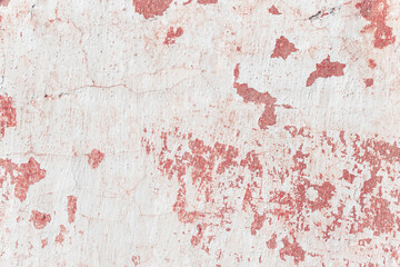 Grunge red concrete background. Textured plaster wall. Color of the year 2025 concept. Top view, layout for design. Surface with peeling shabby pattern.