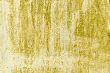 Grunge yellow concrete background. Textured plaster wall. Color of the year 2025 concept. Top view, layout for design. Surface with peeling shabby pattern.