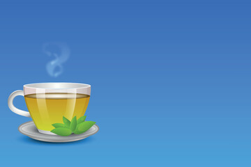 A transparent cup of hot green tea with a sprig of leaves on a saucer on the side of the image on a blue background.