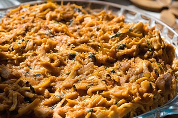 shredded chicken with sauce and seasonings ready to fill homemade chicken coxinha