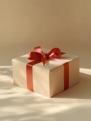Obraz premium This large gift box, adorned with neutral wrapping paper and a bright red ribbon, is ready for a joyful celebration and surprise. Generative AI