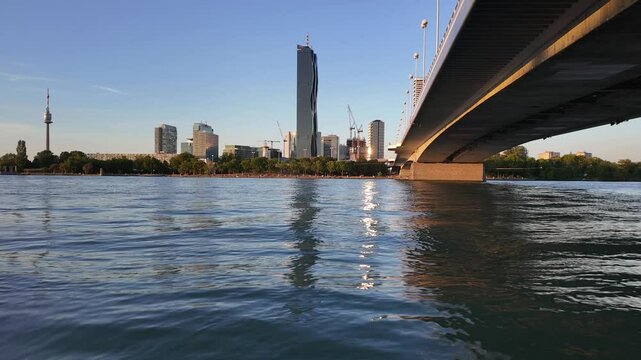 Vienna Austria new skyline district. Dynamic urban development with new skyscrapers with different architectures located in front of the Danube and the Reichsbr&uuml;cke bridge panoramic view