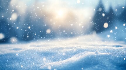 A still, snow-covered valley with a soft blue sky blurred in the background and gently falling snowflakes.