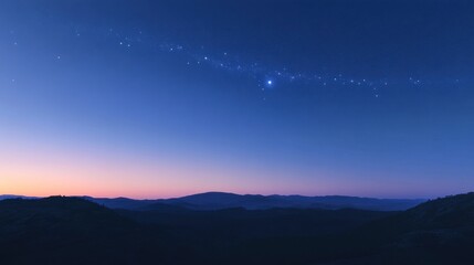 Fototapeta premium The horizon at twilight with a blue sky overhead, scattered stars, and the soft glow of the galaxy's spiral.