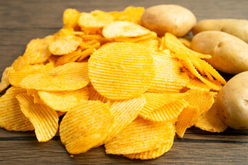 Potato chips , delicious BBQ seasoning spicy for crips, thin slice deep fried snack fast food.