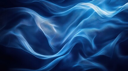 Fototapeta premium Abstract blue fabric texture with soft waves and folds, creating a smooth and elegant background.