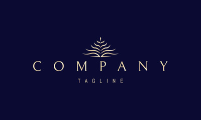 Vector golden logo with an abstract image of a tree with wavy branches.