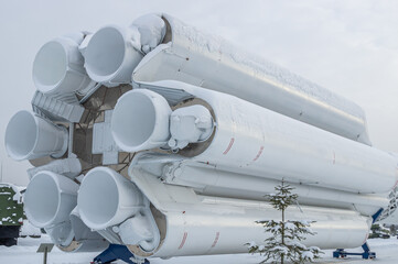A rocket designed to launch a payload into outer space. A space rocket for delivering objects to the orbit of the planet Earth. The nozzles of the launch vehicle. © Eduard Belkin