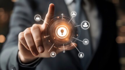 A businessman's finger touches a glowing light bulb icon surrounded by various network icons.