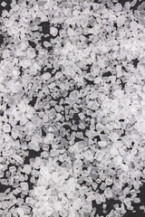 Translucent Crystals Scattered on a Dark Background