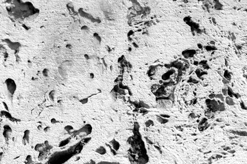 Natural stone wall texture with gap, close -up background.