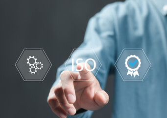 ISO Certification Concept. Businessman touch representation of ISO certification, icons symbolizing...