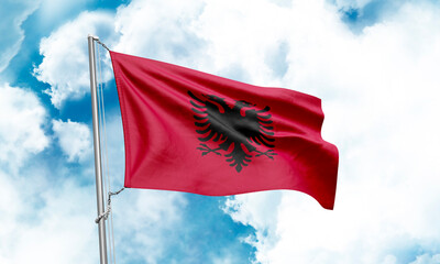 Albania flag waving on sky background. 3D Rendering