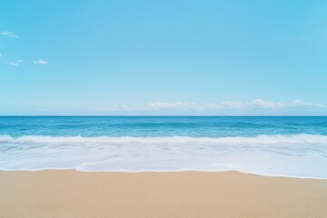 Fototapeta premium tranquil beach scene with blue ocean and clear sky