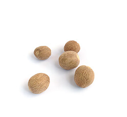 Nutmeg and ground nutmeg isolated on white background