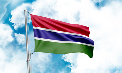 Gambia flag waving on sky background. 3D Rendering