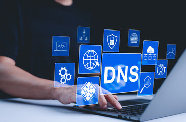 DNS domain name system and web server network system concept. A person uses a laptop, with DNS and...
