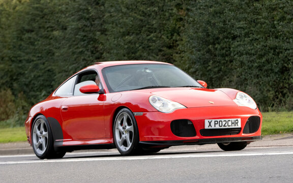 2002 red Porsche 911 CARRERA 4S TIP S