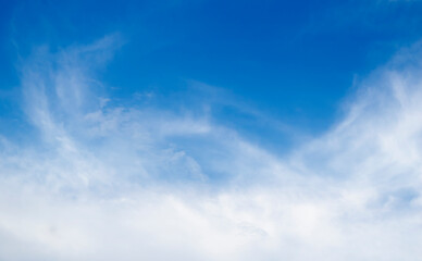 Fototapeta premium Large white clouds. Sky with fluffy white cloudscape texture. Wide blue sky nature background, cloudy