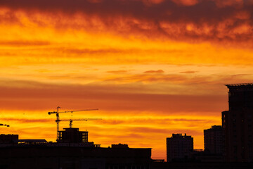 Fiery Sunset Sky Over City Silhouettes
