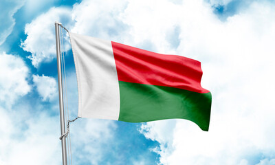Madagascar flag waving on sky background. 3D Rendering