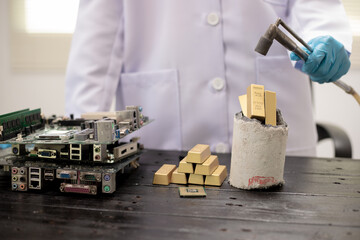Technicians meticulously repair electronic components to turn them into precious gold. This process...